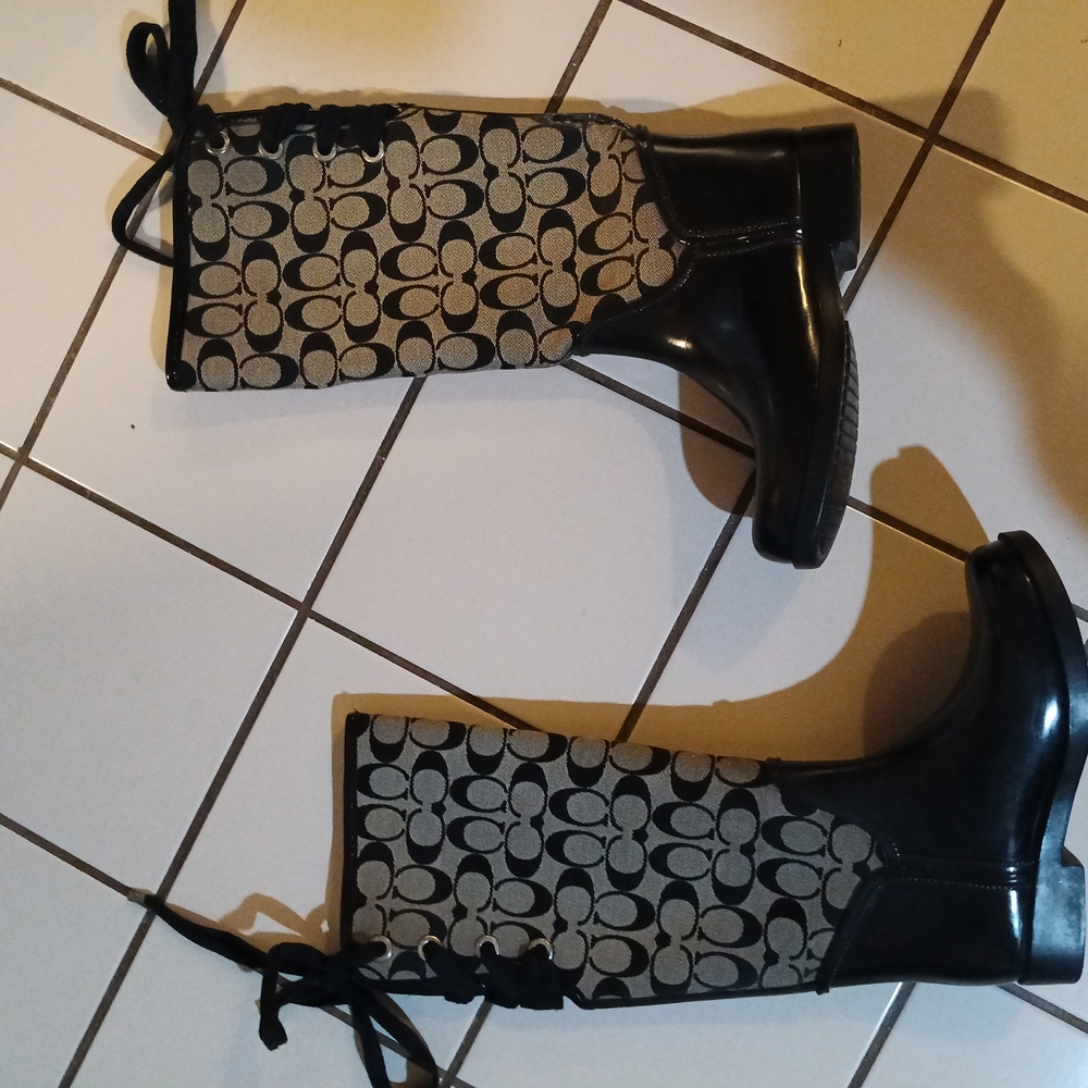 Coach Black and Tan Lace Up Boots with Signature Style
